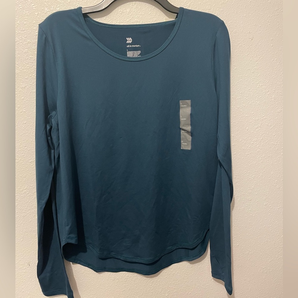 Brand new with tags Teal All in Motion long sleeve shirt with thumb holes
